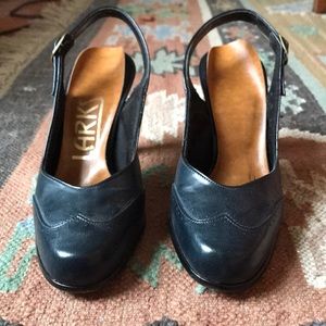 Navy leather heels with embossed detailing